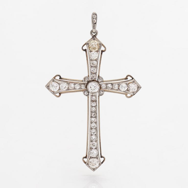 An 18K gold cross pendant with old-cut diamonds ca. 5.43 ct in total. With certificate.