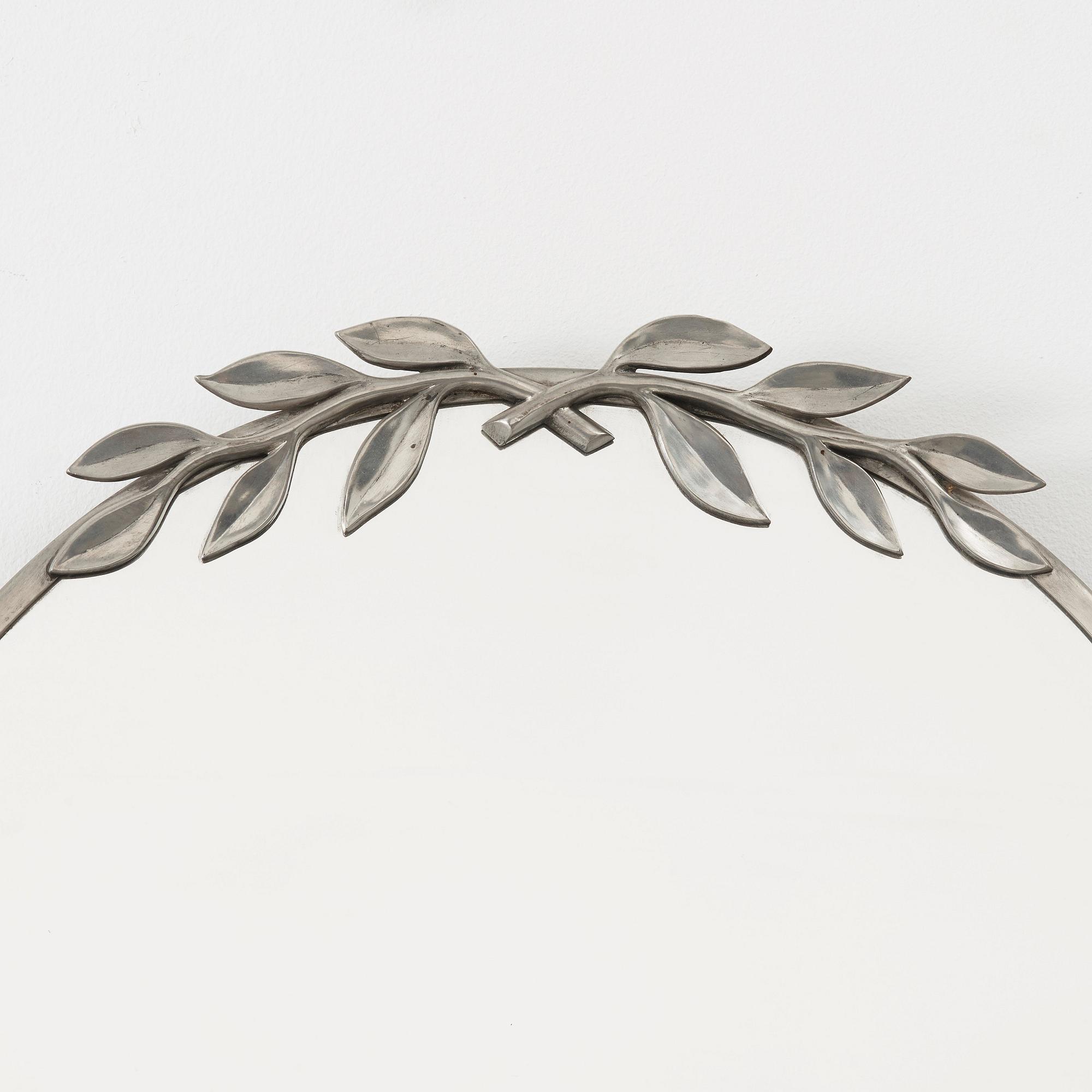 Estrid Ericson, A pewter three-piece mirror, Svenskt Tenn, Stockholm 1939, model 884.