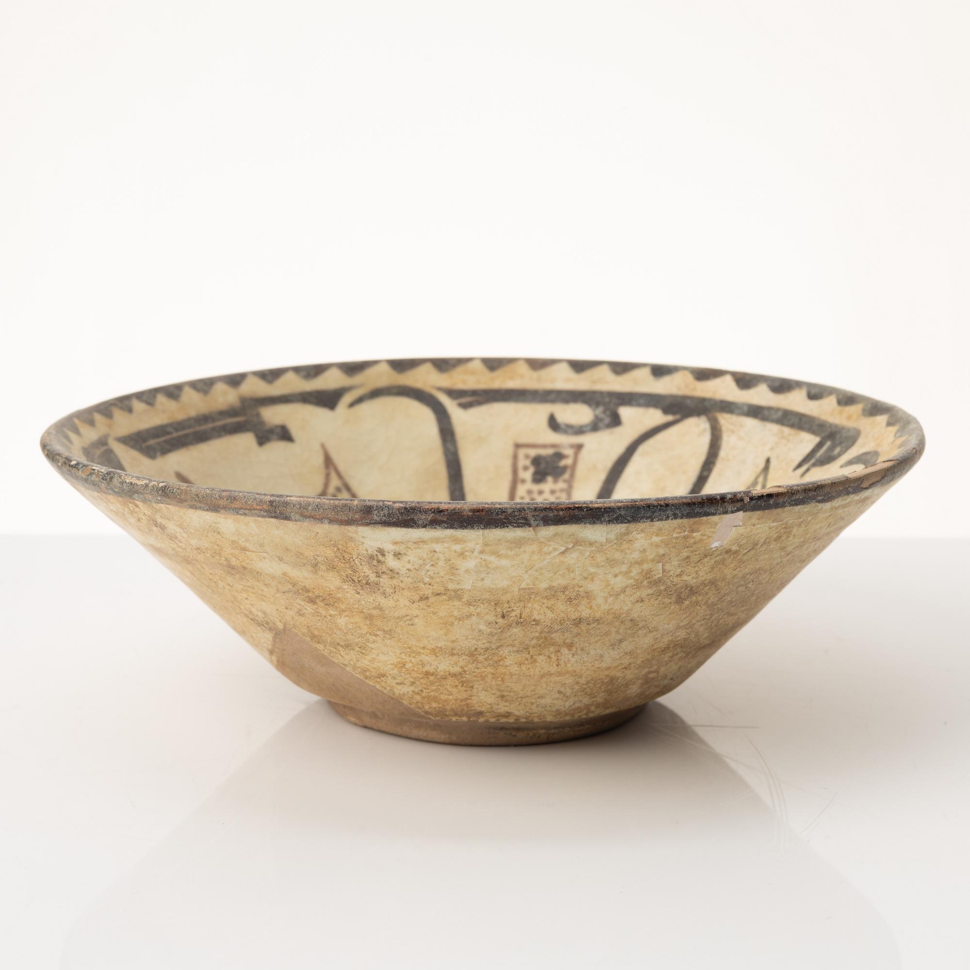A glazed earthenware bowl, Central Asia.