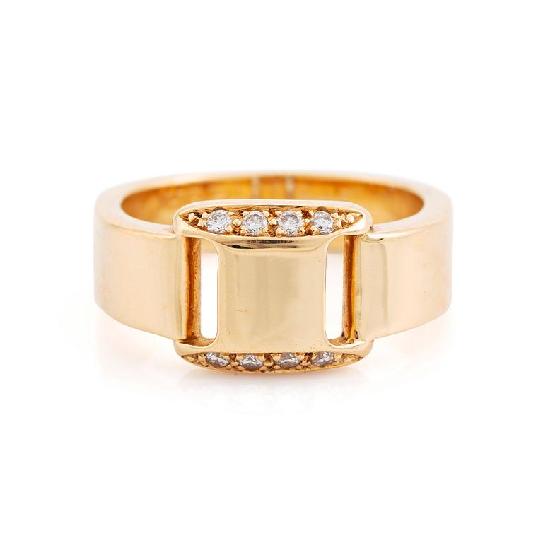 Hermès 18K gold ring set with round and brilliant-cut diamonds.