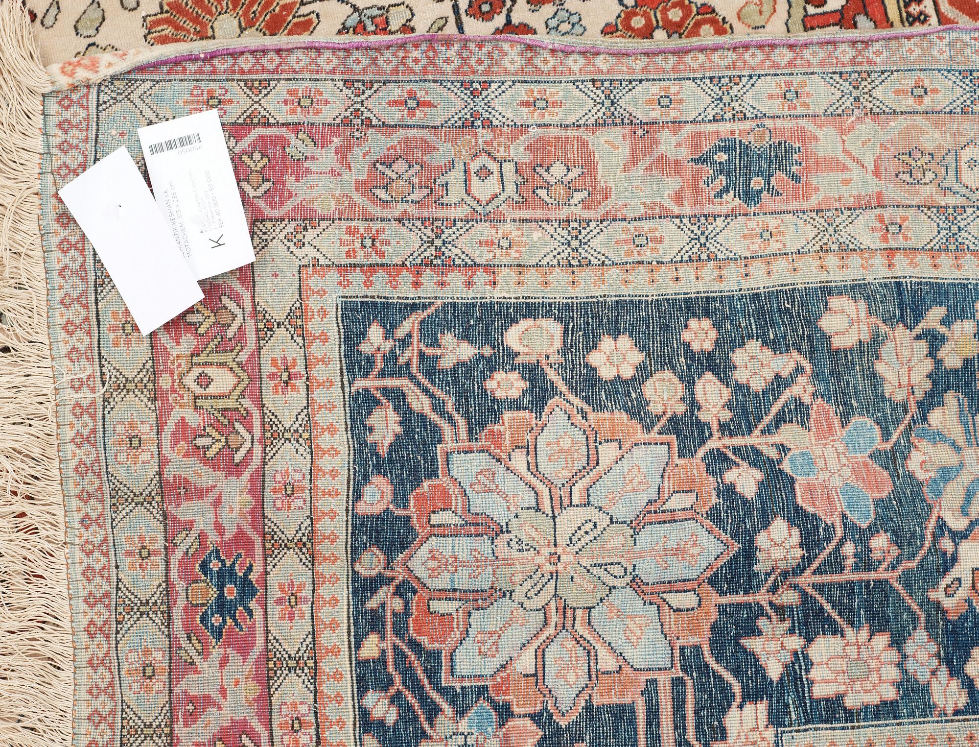 SEMI-ANTIQUE KASHAN so called MOTACHEM. 313 x 235 cm.