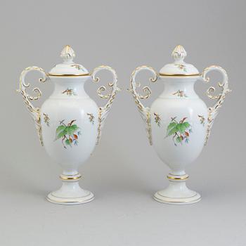 A pair of mid 20th century porcelain urns, Herend, Hungary.