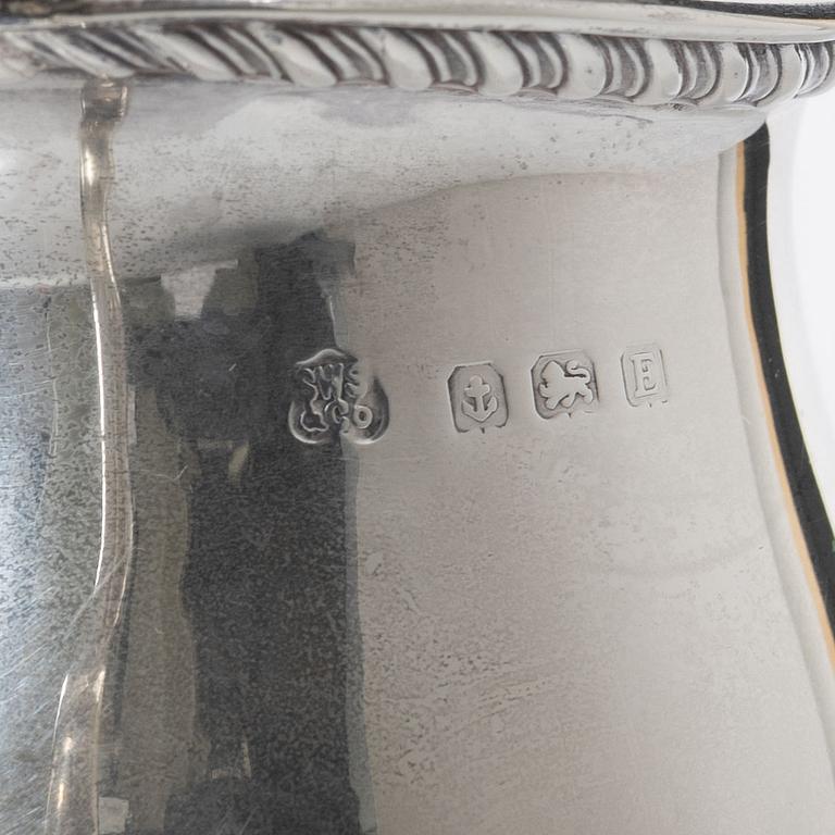 A silver cream jug, mark of S W Smith & Co, Birmingham, England 1929.