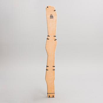 A "Rosegarland" ceramic relief signed Bryk.