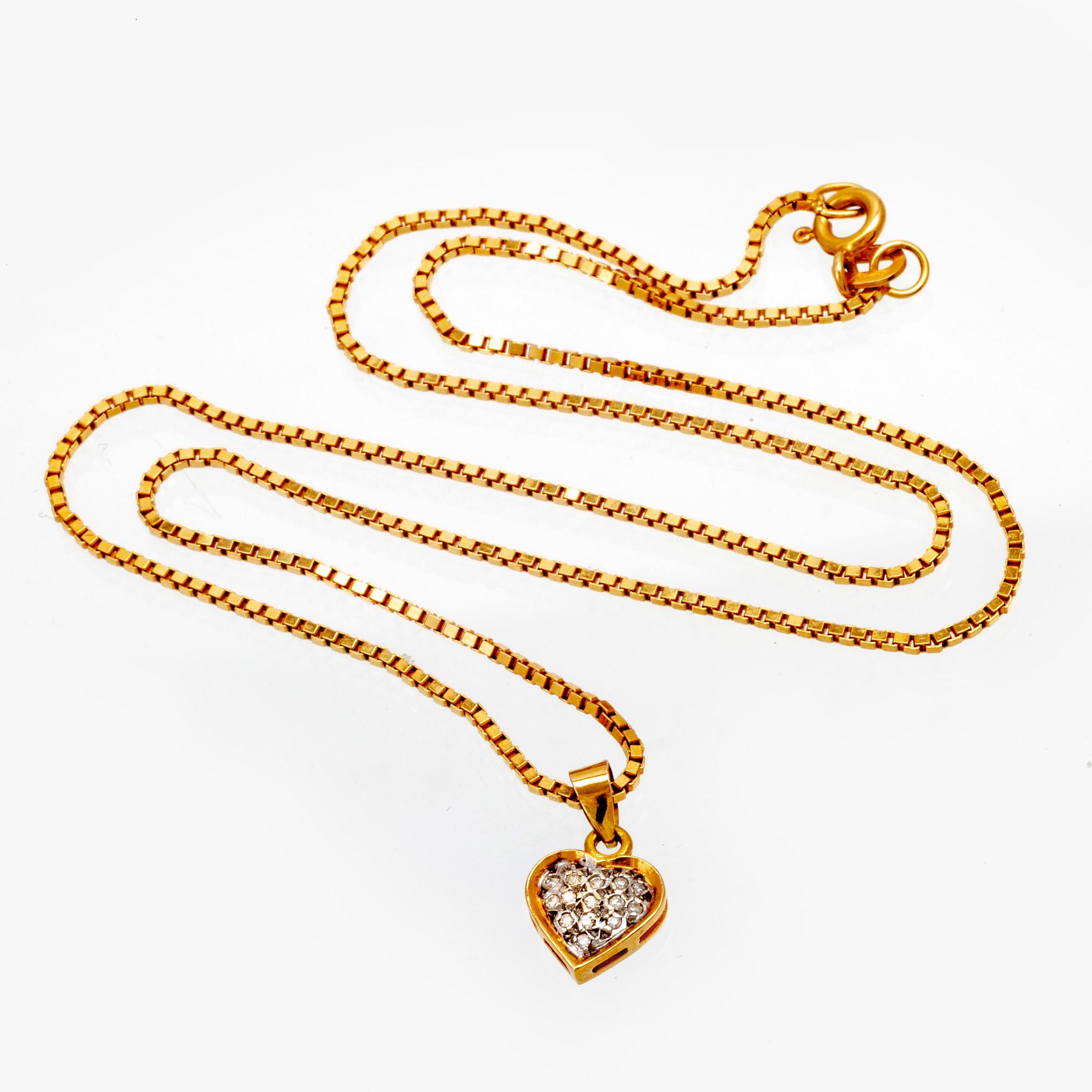 An 18K gold necklace with octagonal cut diamonds.