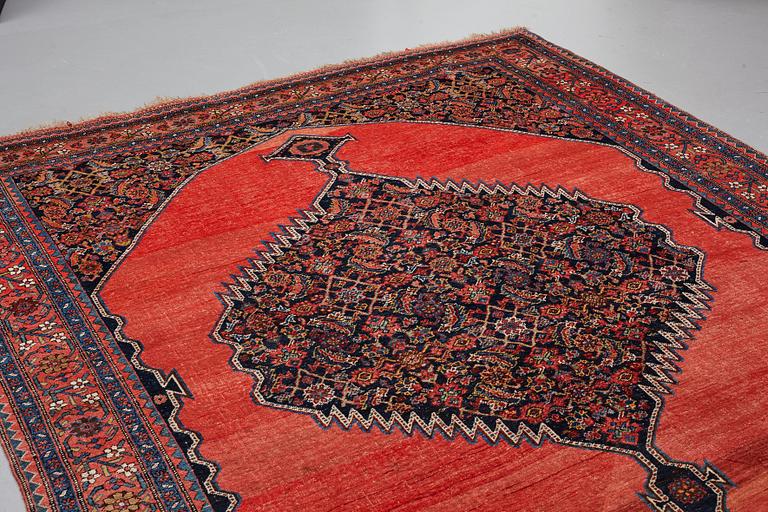 A CARPET, an antique Bidjar kelly, ca 587 x 230 cm.