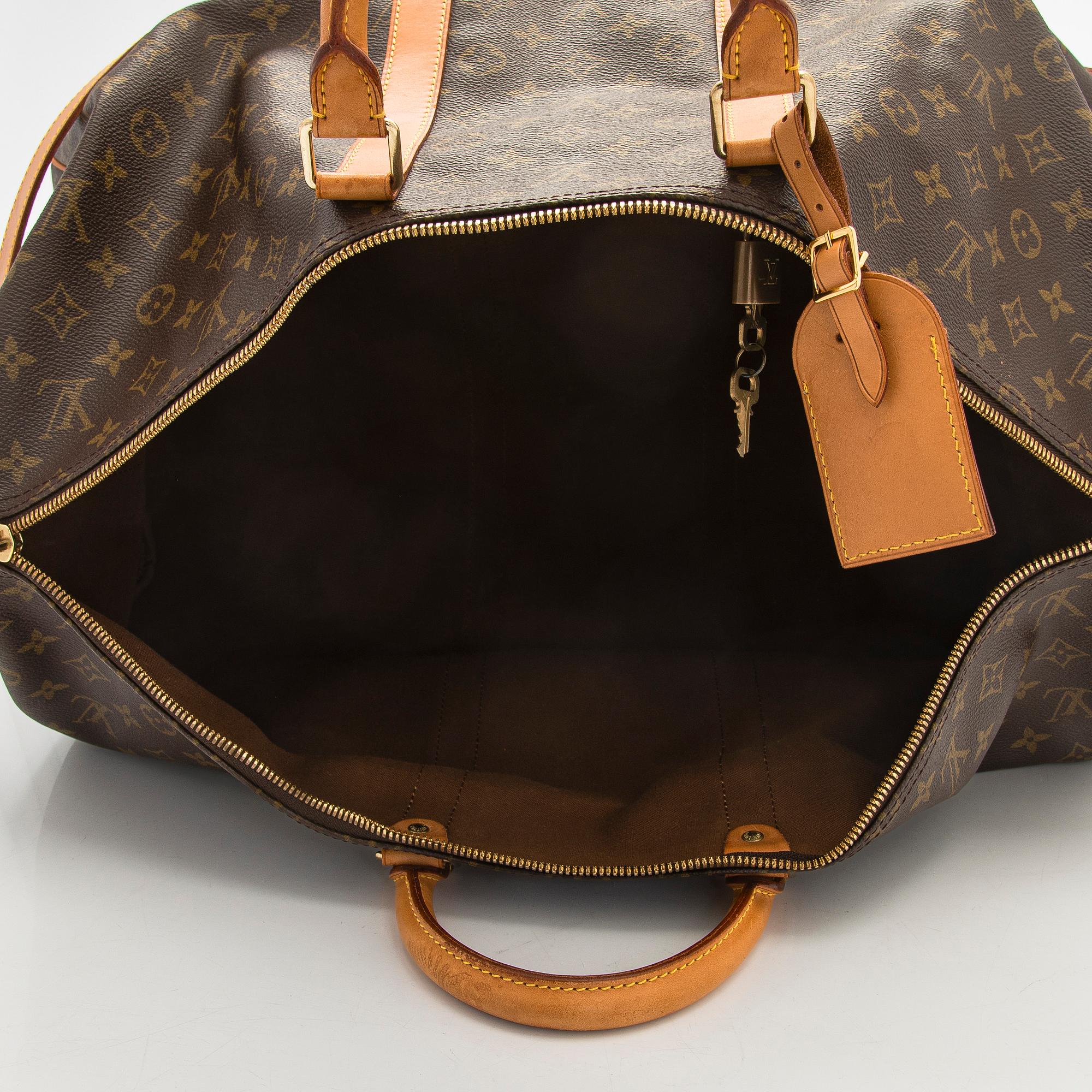 Louis Vuitton, a Monogram Canvas 'Keepall 55 Bandoulière' weekend bag.