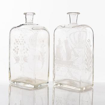 A set of seven glass bottles, 19th Century/circa 1900.