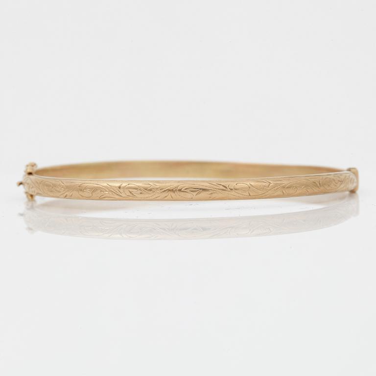 ARMRING, guld 18k, Stockholm 1900-tal. Vikt ca 6 gram.