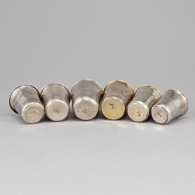 A set of six Russian 19th century parcel-gilt silver vodka cups.