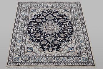 A rug, Nain, part silk, ca 198 x 144 cm.