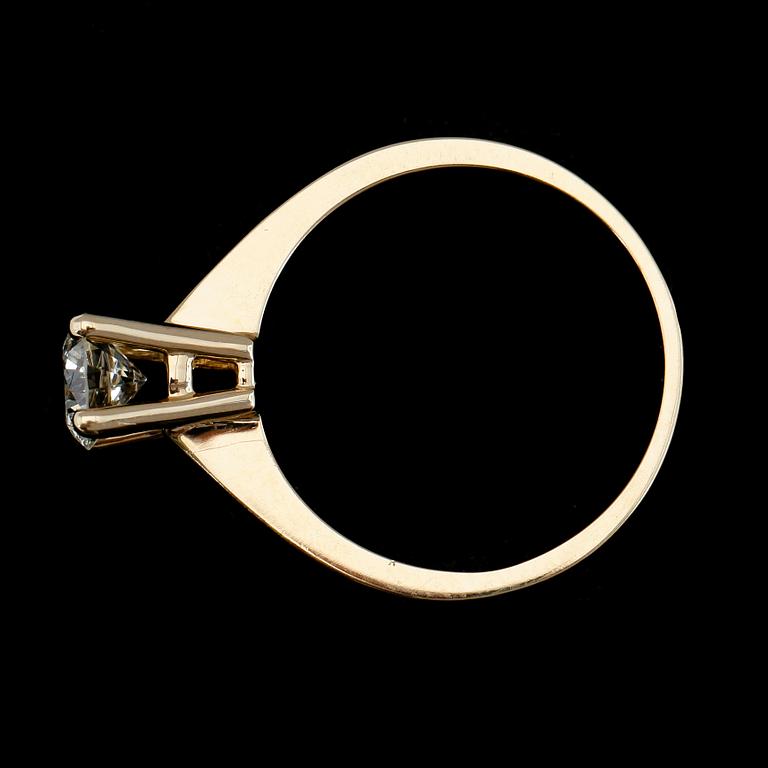 RING, 14K guld, solitär briljantslipad diamant ca 0.73 ct.