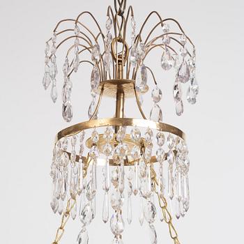 A late Gustavian gilt brass and cut glass seven-light chandelier, late 18th century.