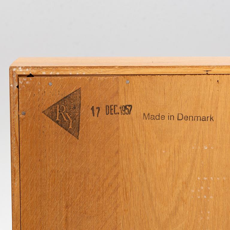 Hans J. Wegner, 2 cabinets and a shelf with a writing flap, Ry furniture, dated 1957.