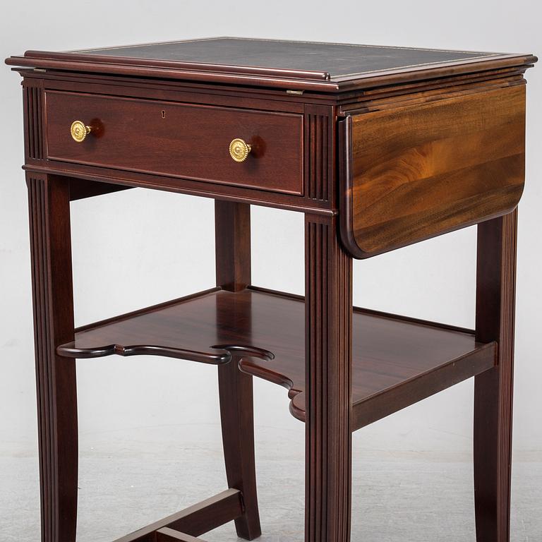 a mahogany writing desk from the second half of the 20th century.