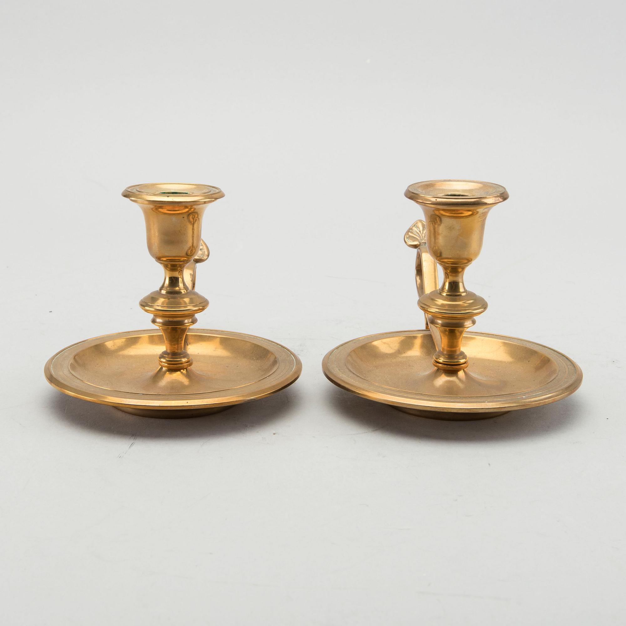 A pair of Gusum brass candelsticks.