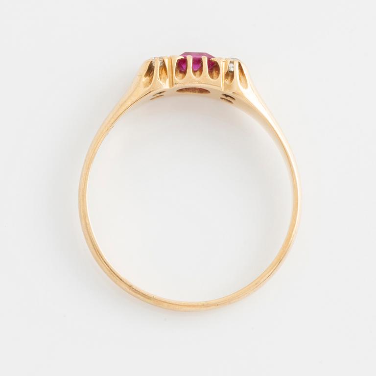 Ring, gold with synthetic pink stone and small white stones.