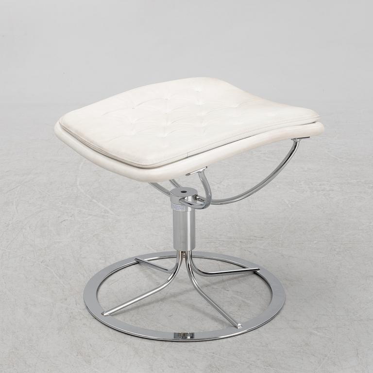 A 'Jetson' foot stool by Bruno Mathsson.