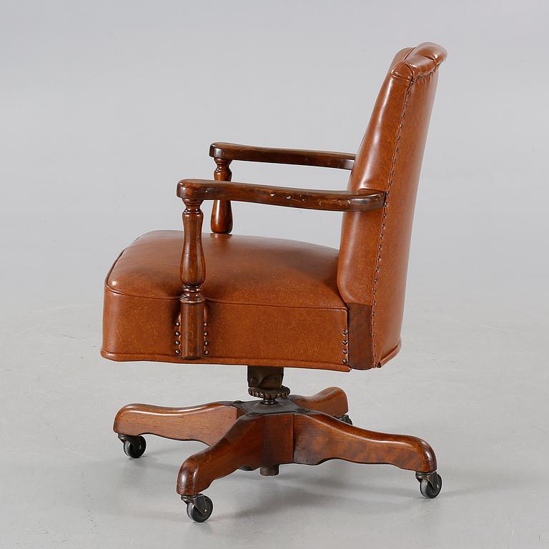 A desk chair from The Marble & Shattuck Chair Company in Ohio, around the mid 20th century.