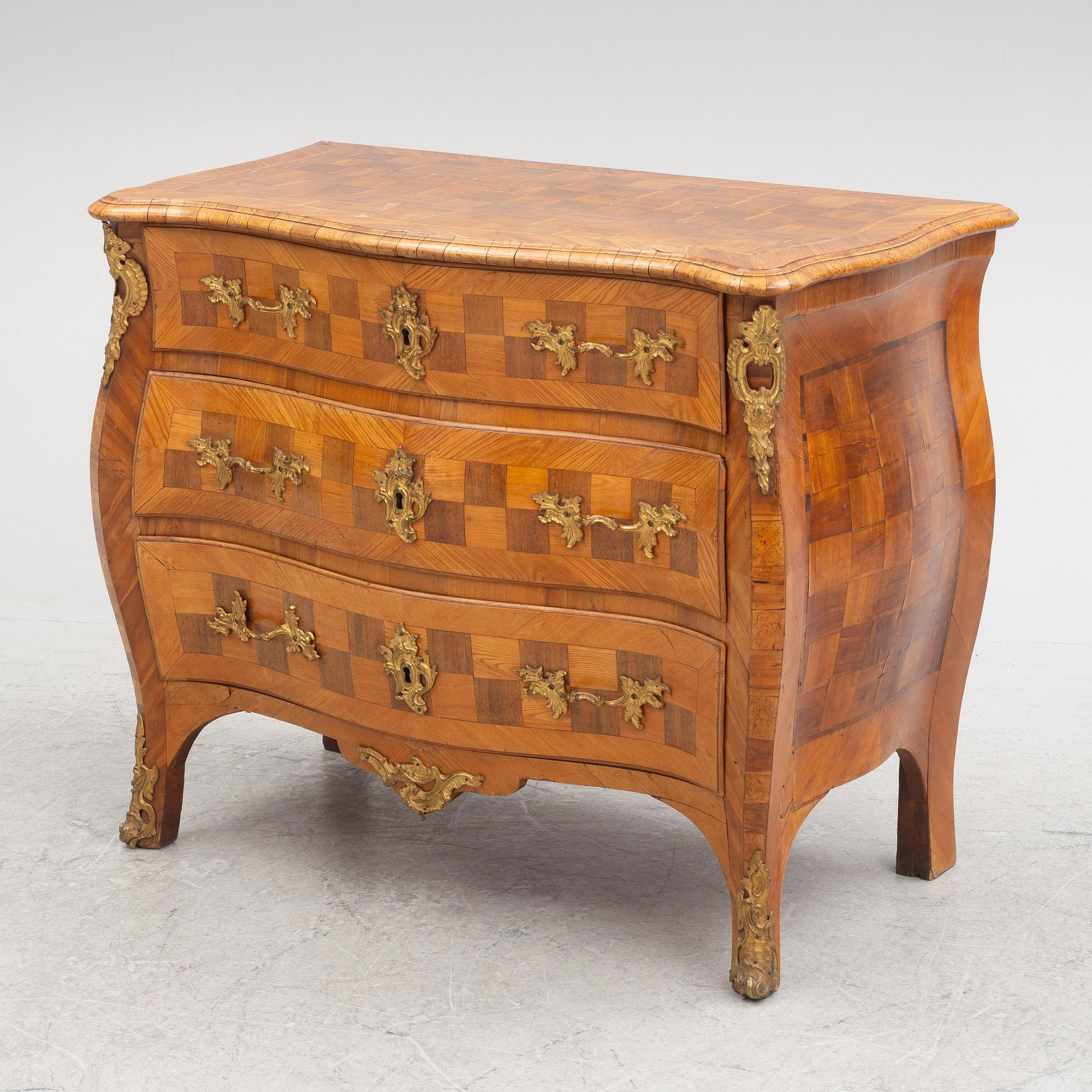 A Swedish rococo parquetry commode, later part 18th century.