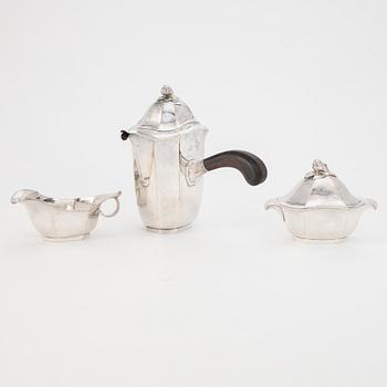 Jacob Ängman, a silver coffee pot, creamer and sugar bowl, GAB, Stockholm 1929.