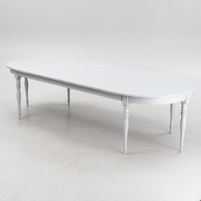 A late 19th century painted dining table.