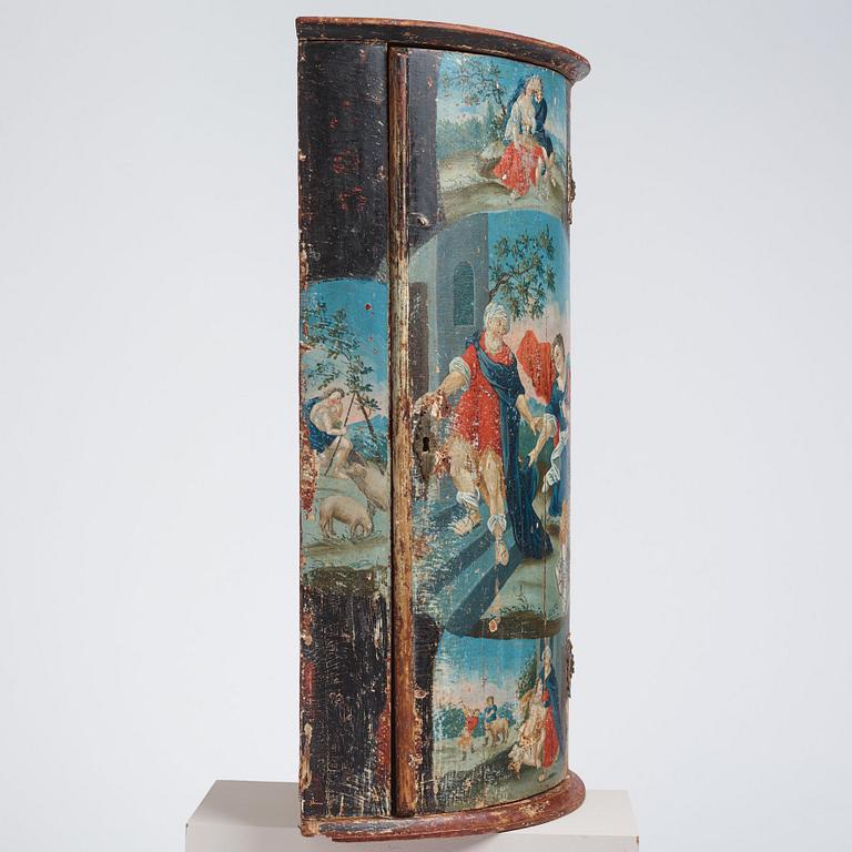 A Swedish late Baroque polychrome-painted corner cabinet, mid 18th century.