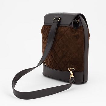 Chanel, a brown suede and leather one strap backpack/sholder bag, 1991-1994.