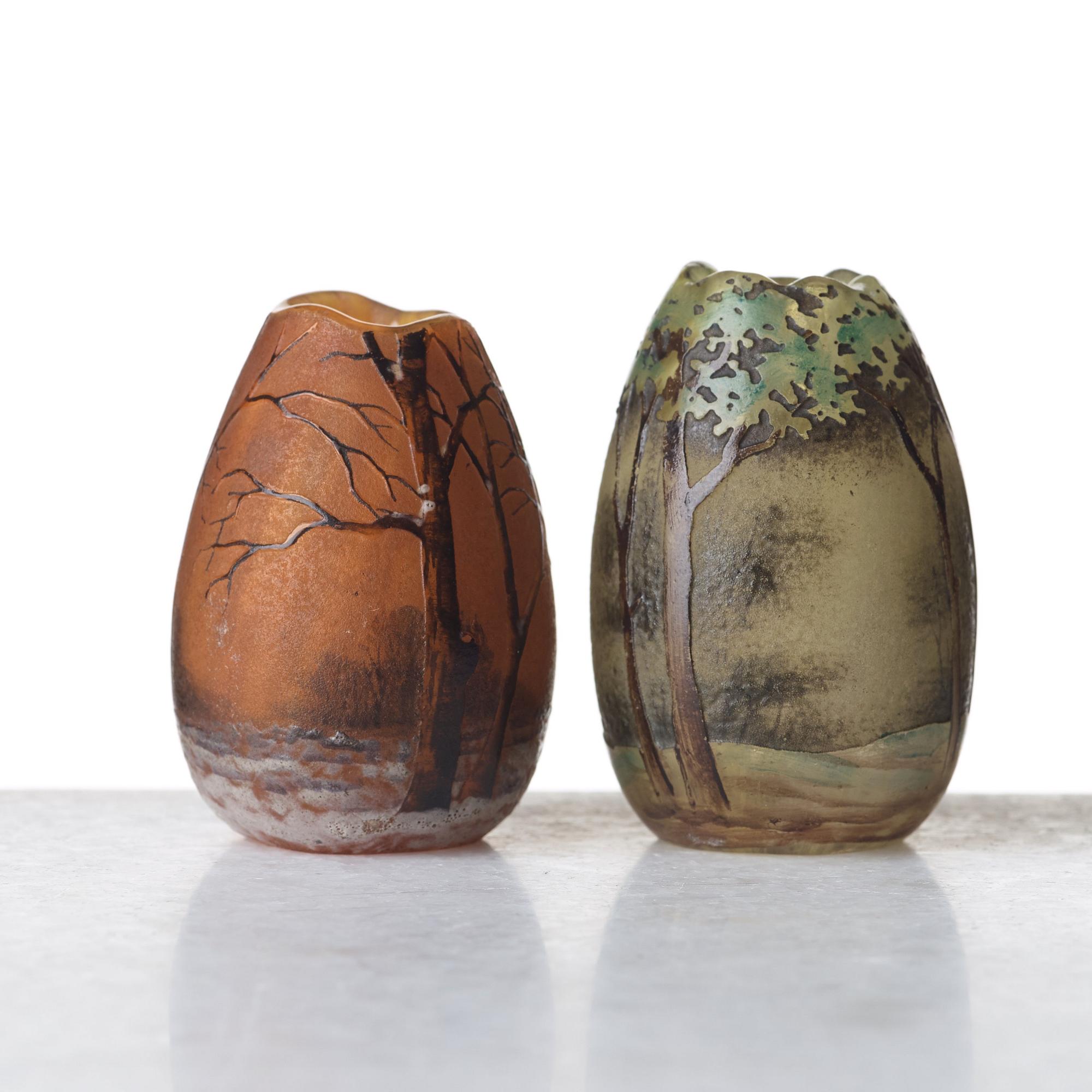 Daum, two Art Nouveau etched and enamel painted glass vases, Nancy, France.