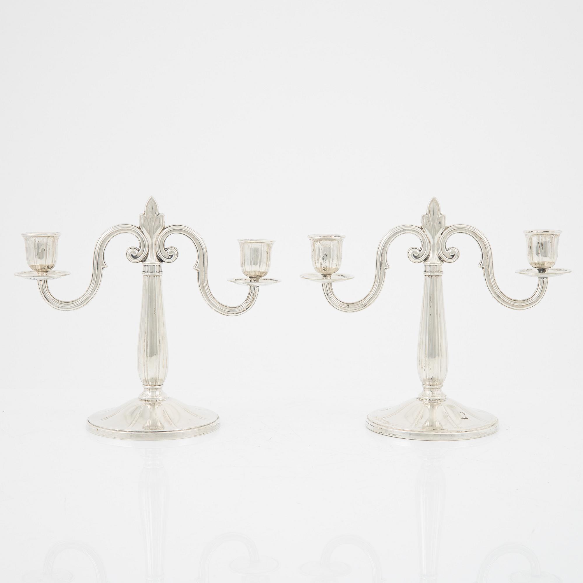 A pair of Swedish silver candelabra, mark of GAB, Stockholm 1931.