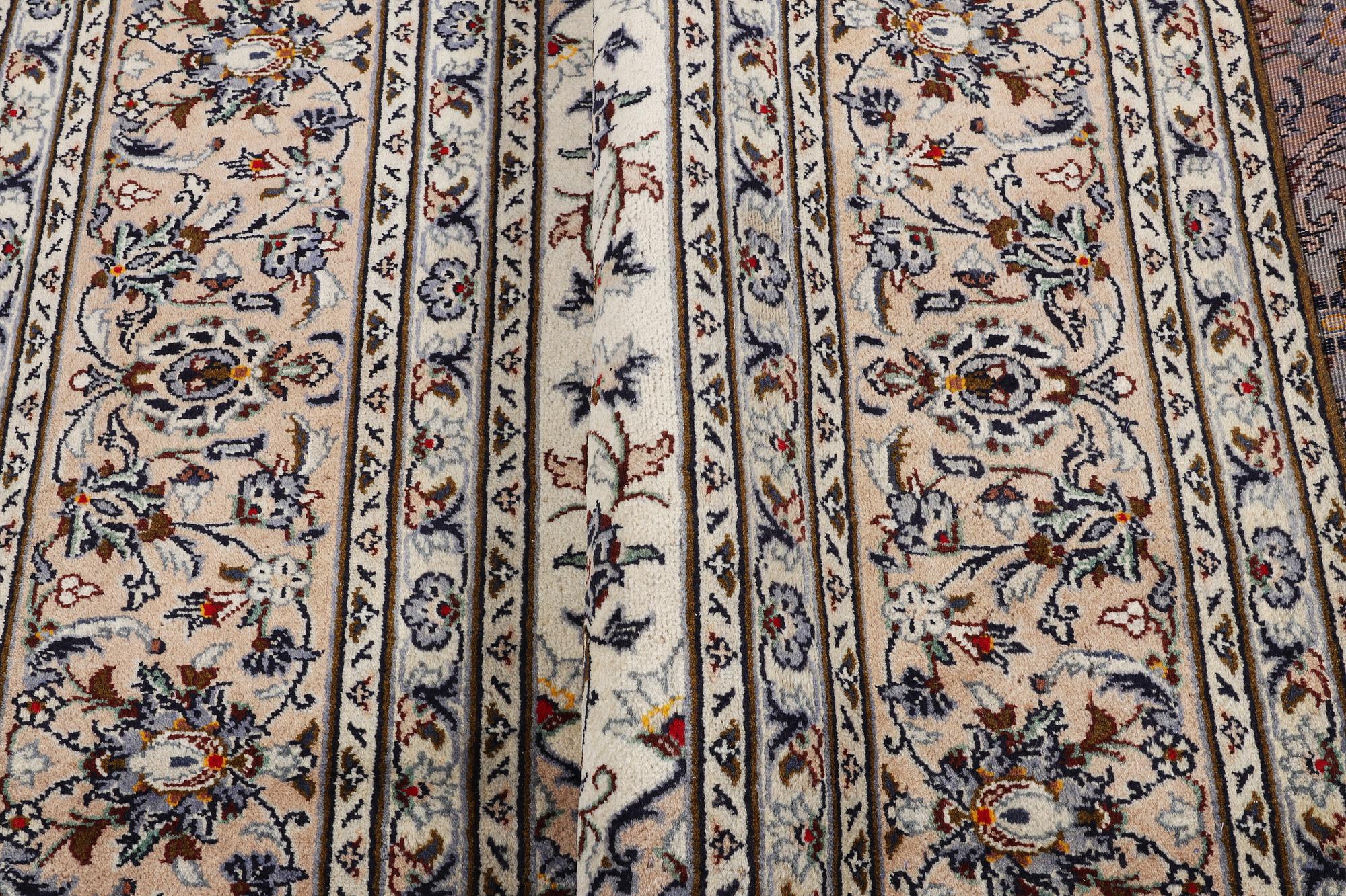 A carpet, Kashan, ca 353 x 243 cm.