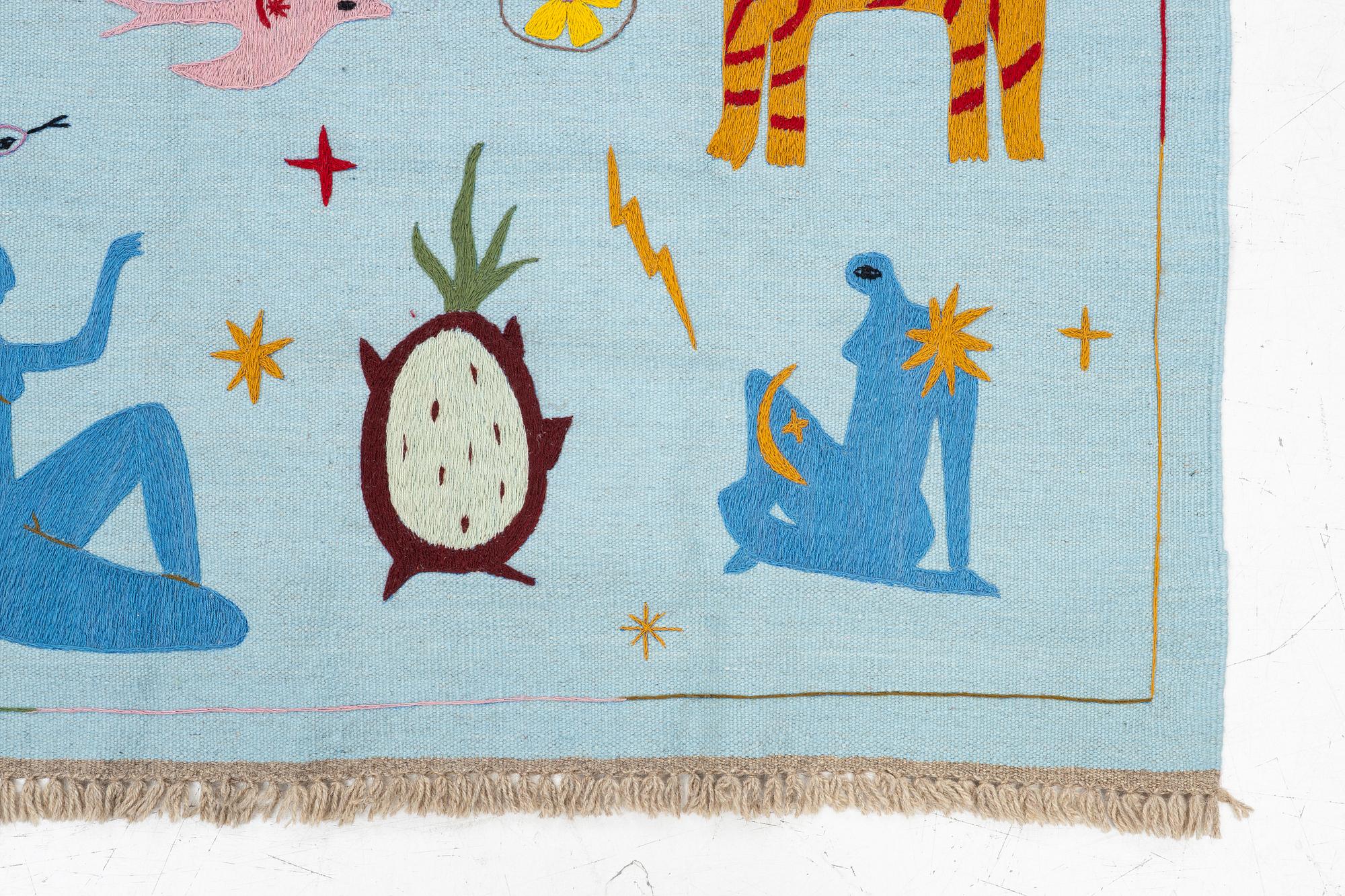 A hand-embroidered kelim rug, c. 189 x 126 cm.