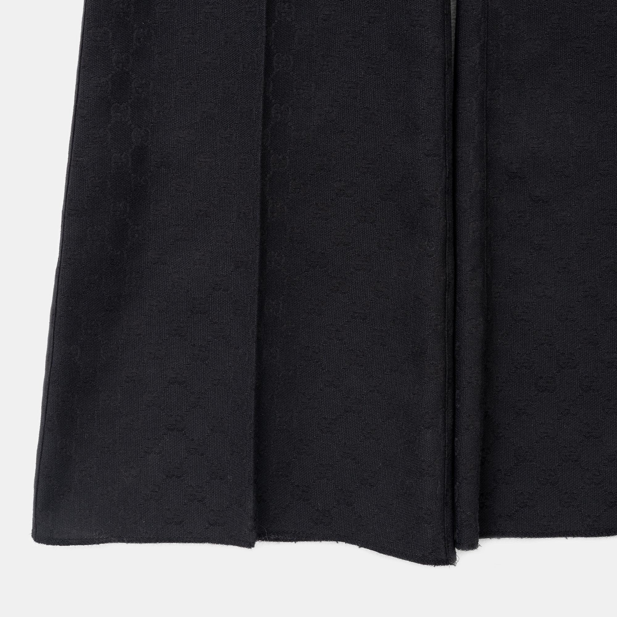 Gucci, a pair of logo pants, size 38.