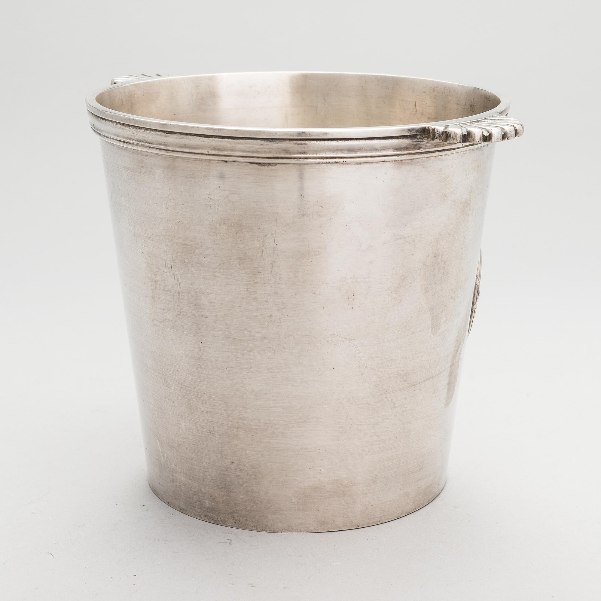 A silver plated brass Charles Heidsieck Champagne cooler.