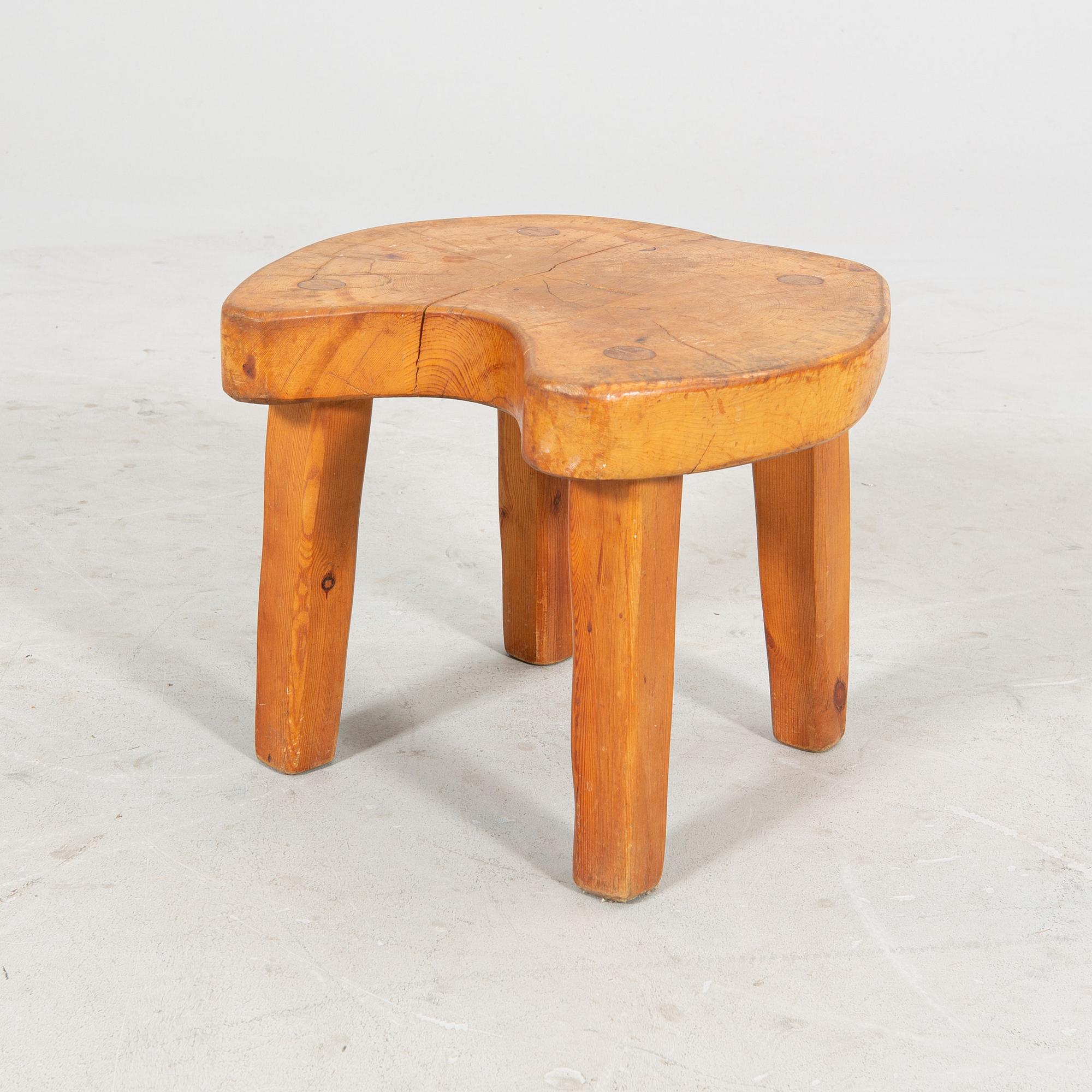 A pine wood stool, second half of the 20th Century.