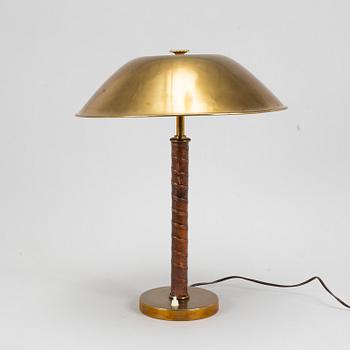 A brass table lamp from Nordiska Kompaniet, 1940's.