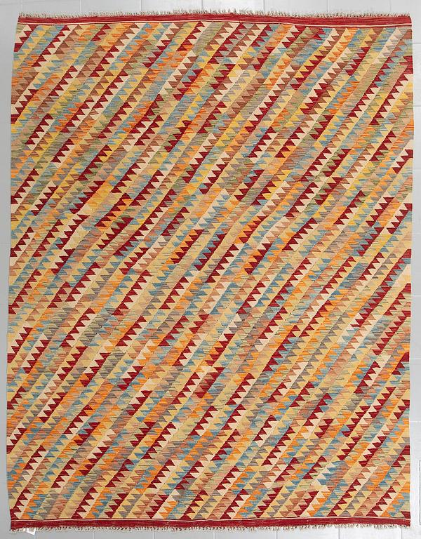 A kelim rug, 250 x 195 cm.