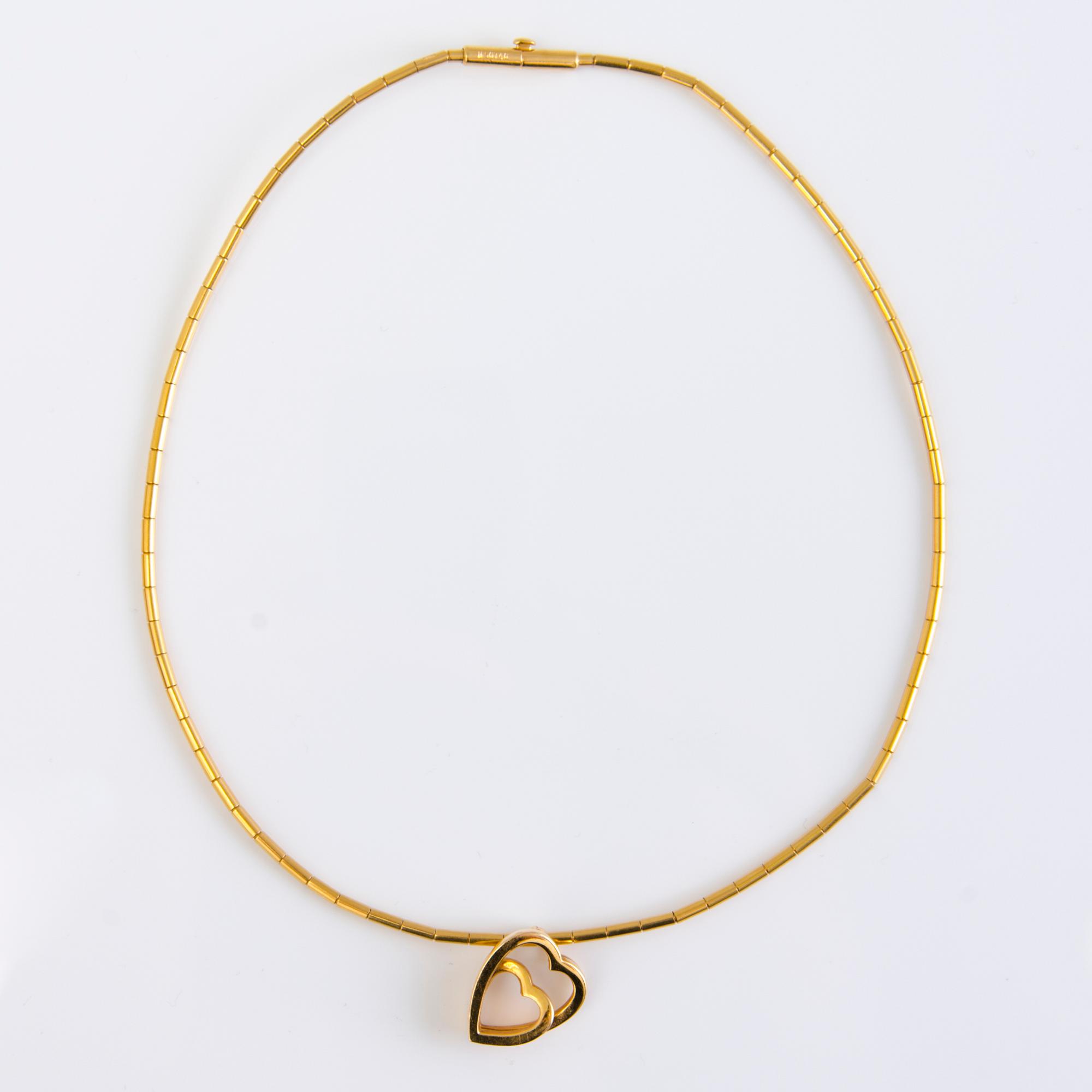 A Cartier 18K gold necklace with heart pendant 1999 and 2001. Certificat and original box.