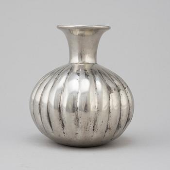 A pewter vase from Firma Svenskt Tenn 1974.