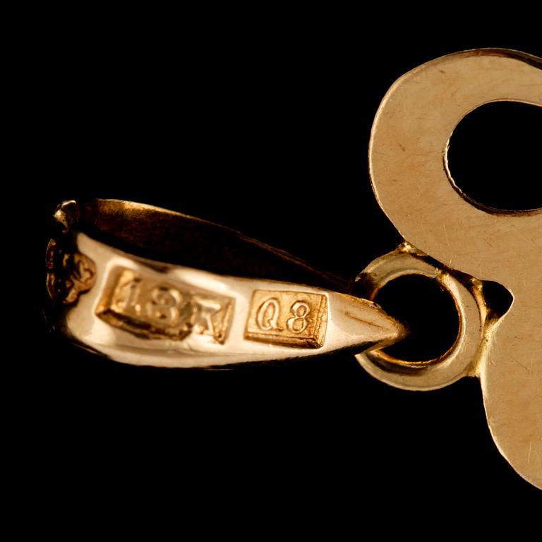 GARNITYR, 3 delar, 18k guld samt syntetiska spineller Gustav Dahlgren & Co Malmö, 1940-tal. Total vikt 11 g.