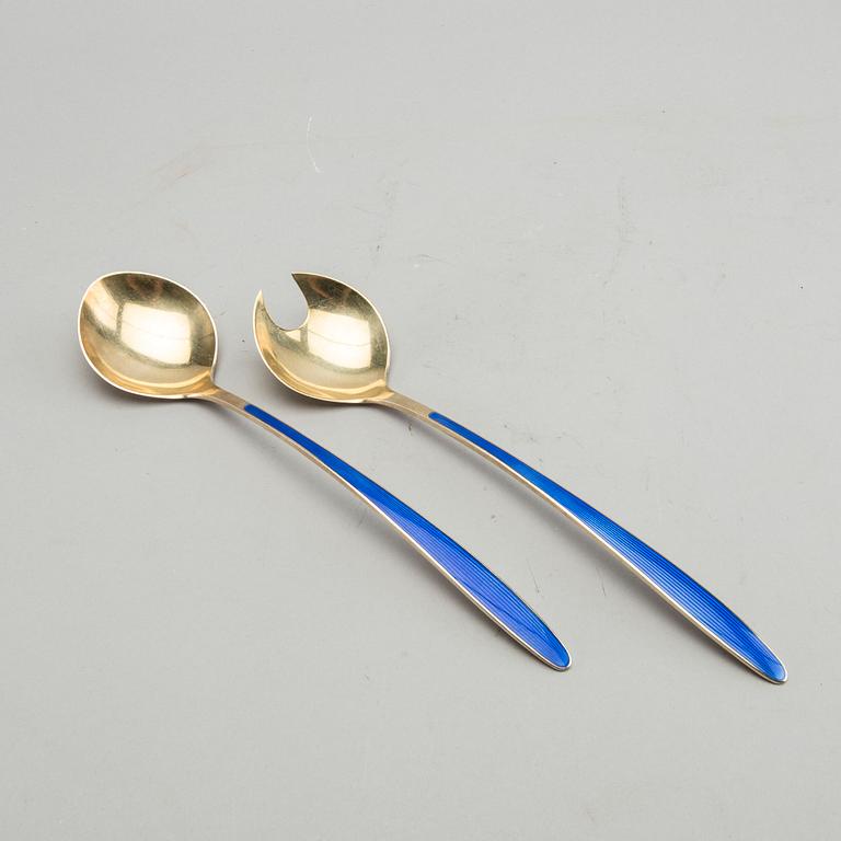 A pair of Norwegian David Andersen mid 20th century sterilng silver sallad-cutlery.