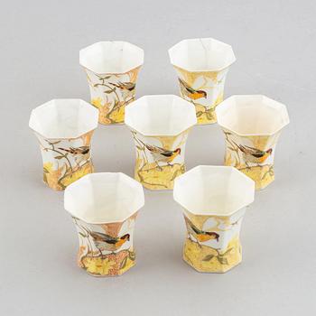 Rozenburg den Haag, seven egg shell porcelain cups and saucers, Holland, early 20th Cnntury.