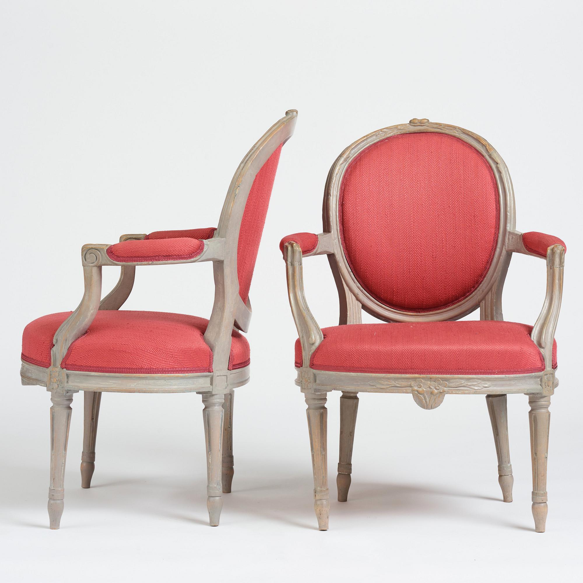 A pair of gustavian armchairs by J E Öhrmark.