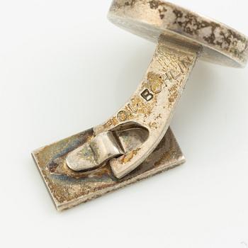 Four pairs of cufflinks, silver, including those by Anders Högberg and Cecilia Johansson.