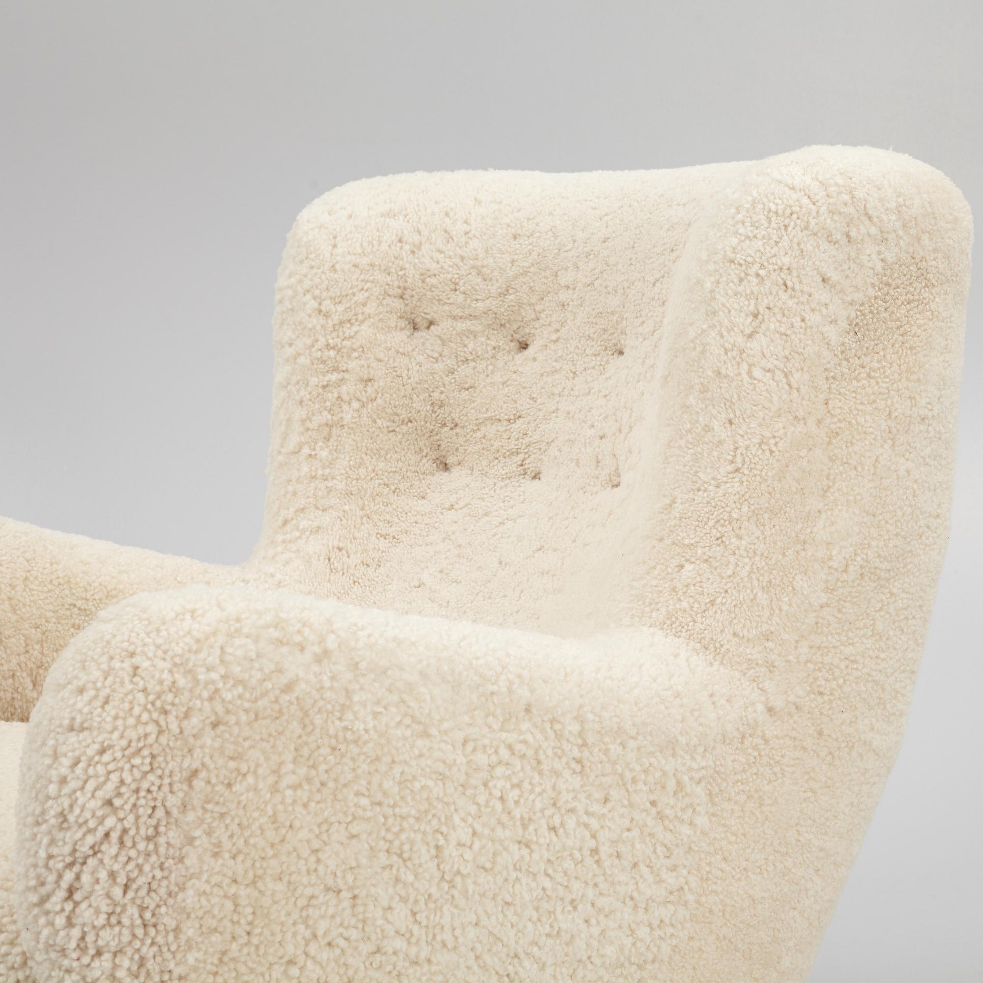 A pair of Danish Modern sheepskin armchairs, 1930's/40's.