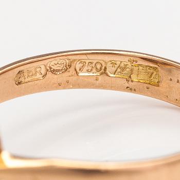 An 18K gold ring with diamonds ca. 0.43 ct in total. Aake Lionel Röyskö, Tampere 1971.