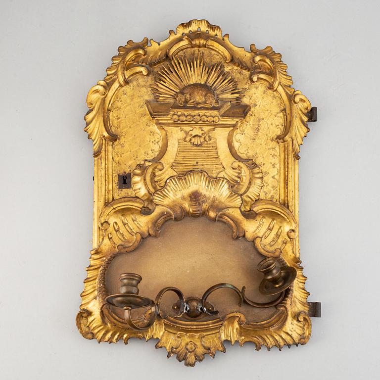 An 18th century  Rococo wall sconce for two candles.
