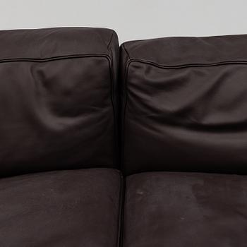 A 21th century sofa "LC3" by Pierre Jeanneret & Charlotte Perriand, Le Corbusier, Cassina, Italy.