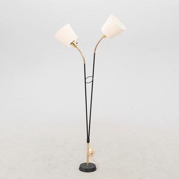 A mid 1900s floor lamp.
