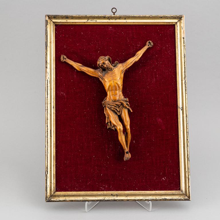 A carved wood crucifix, 17th/18th century.